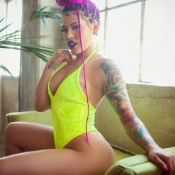 The Sugarpuss Collection Neon Crushed Velvet High Cut Halter Bodysuit In Yellow