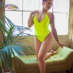 The Sugarpuss Collection Neon Crushed Velvet High Cut Halter Bodysuit In Yellow